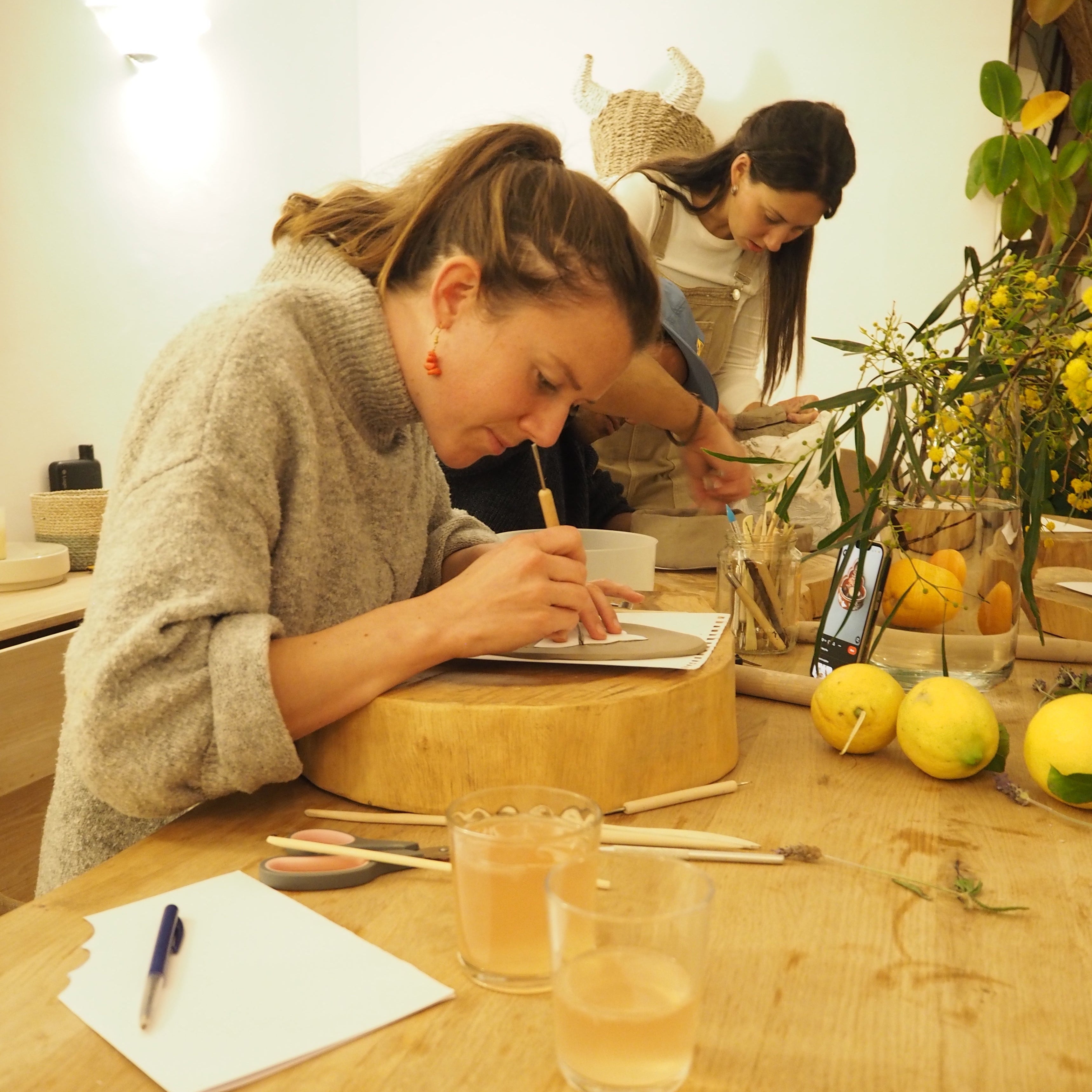 girl-hand-cutting-pottery-workshop